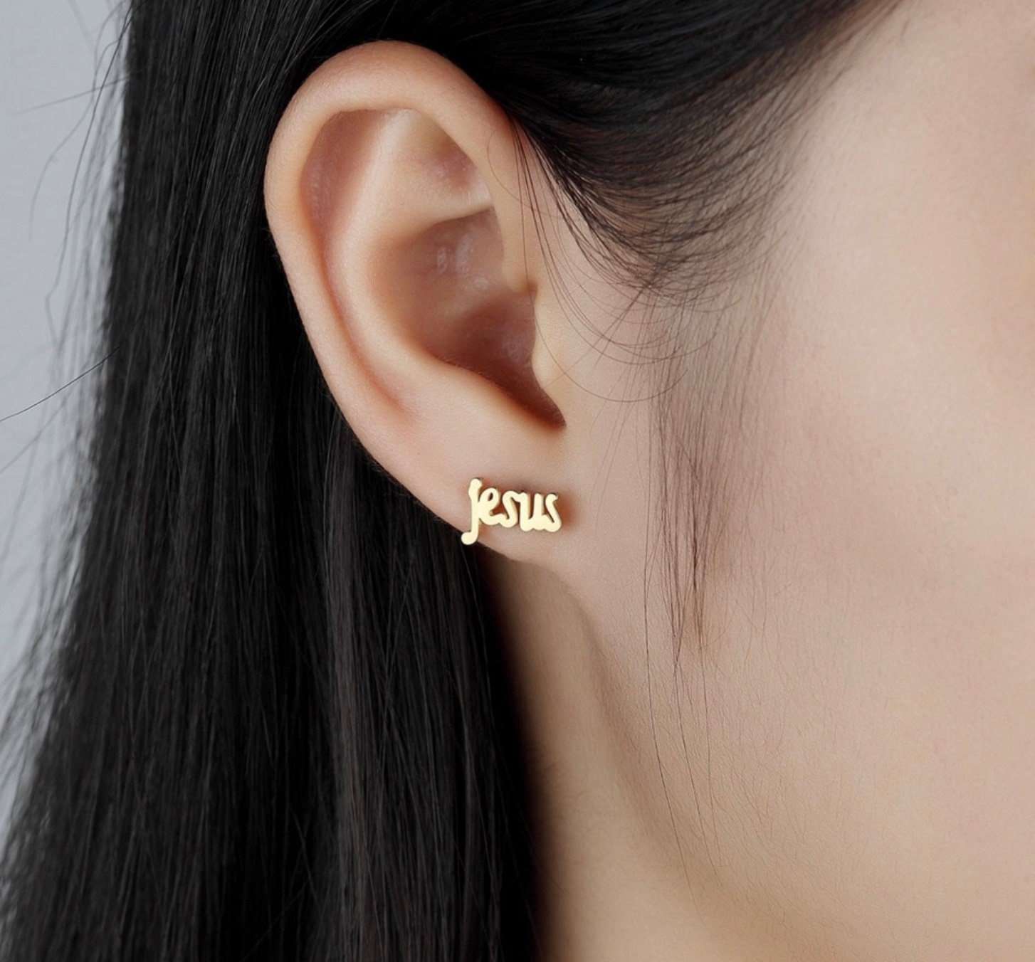Jesus letter stud earrings in gold, small script on front of ear