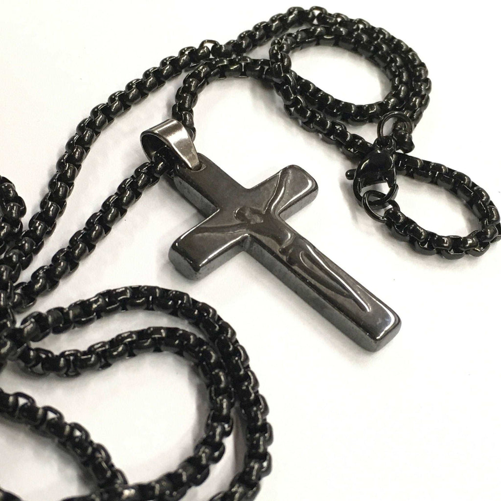 Cross pendant necklace with dark cross charm on black beaded chain