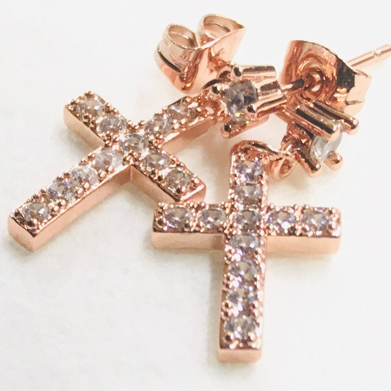 Rose gold CZ cross drop earrings with sparkling stone cross and stud post back