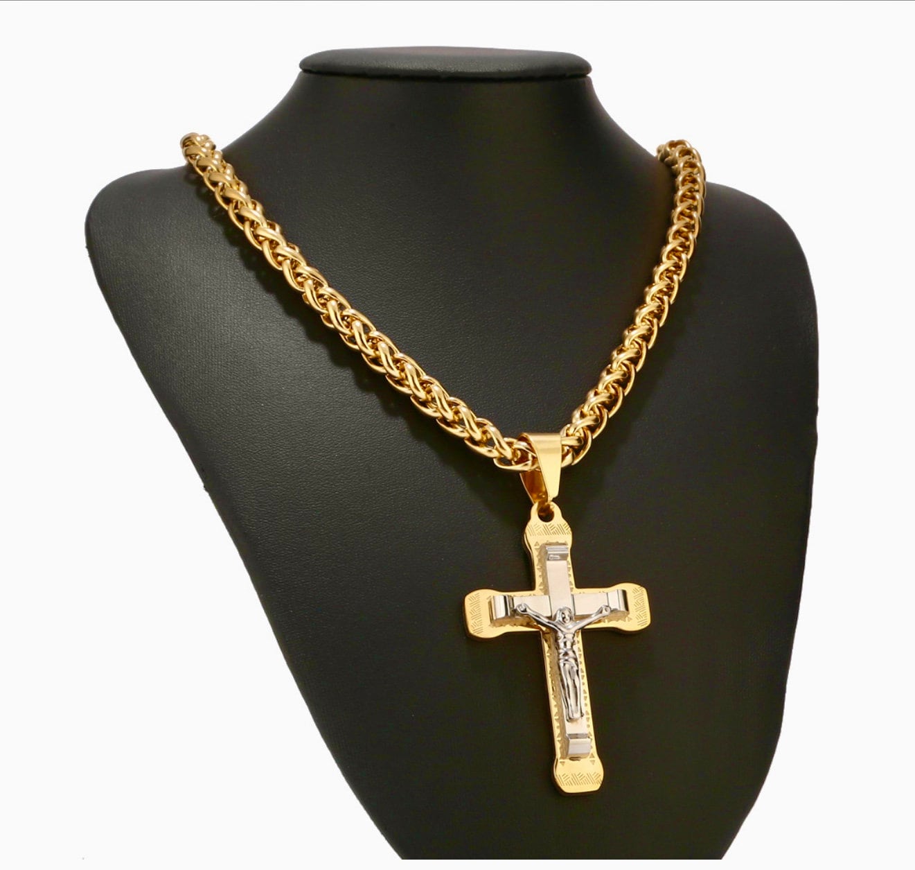 Gold curb chain necklace with two-tone cross pendant