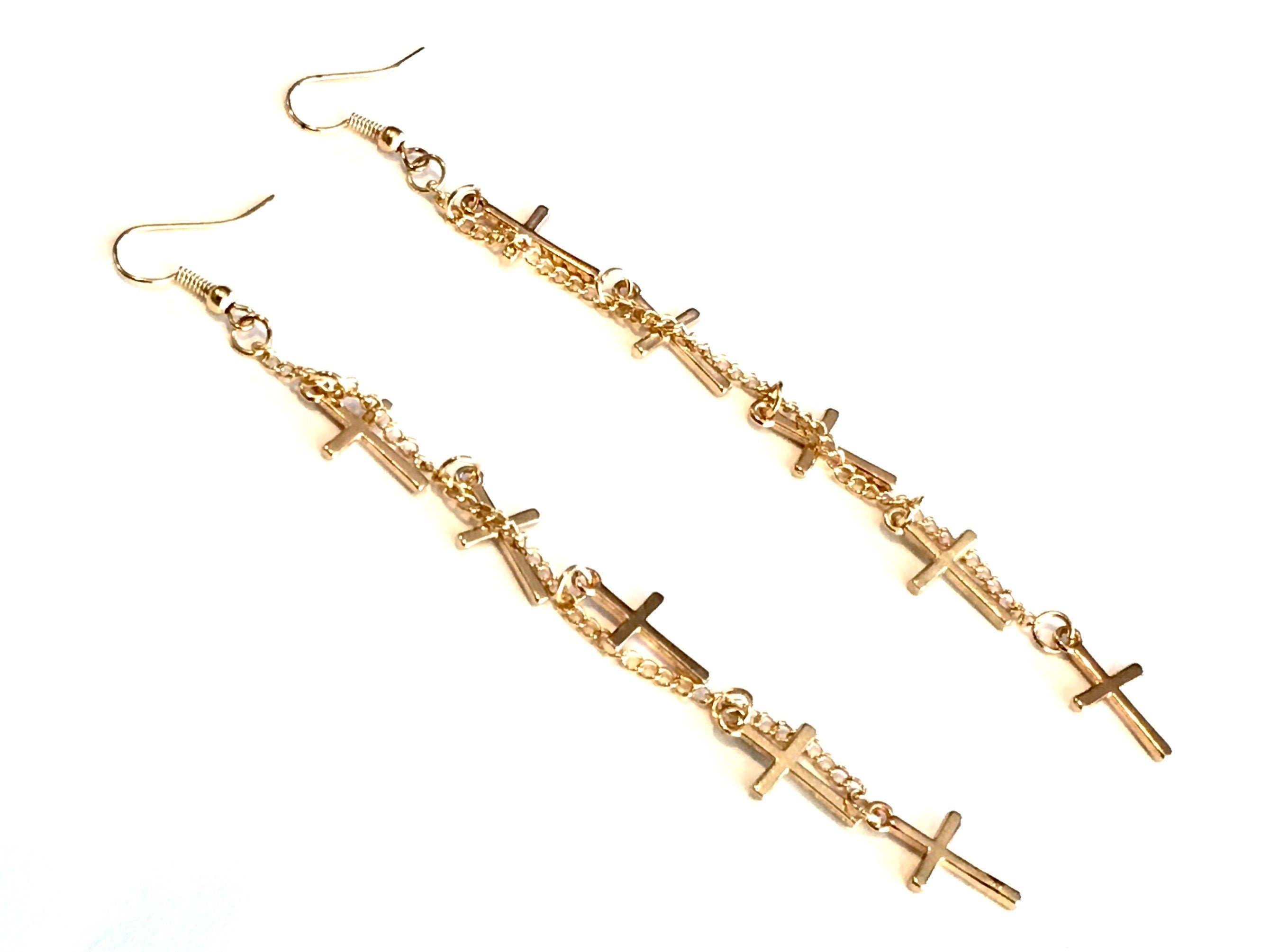 Gold long dangle cross earrings, five small crosses on a chain