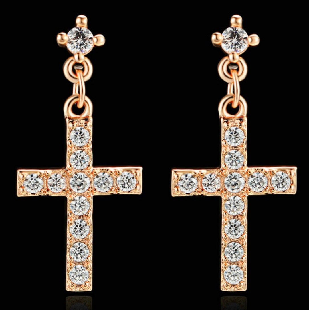 Rose gold CZ cross dangle earrings with round stones and chain-style drop