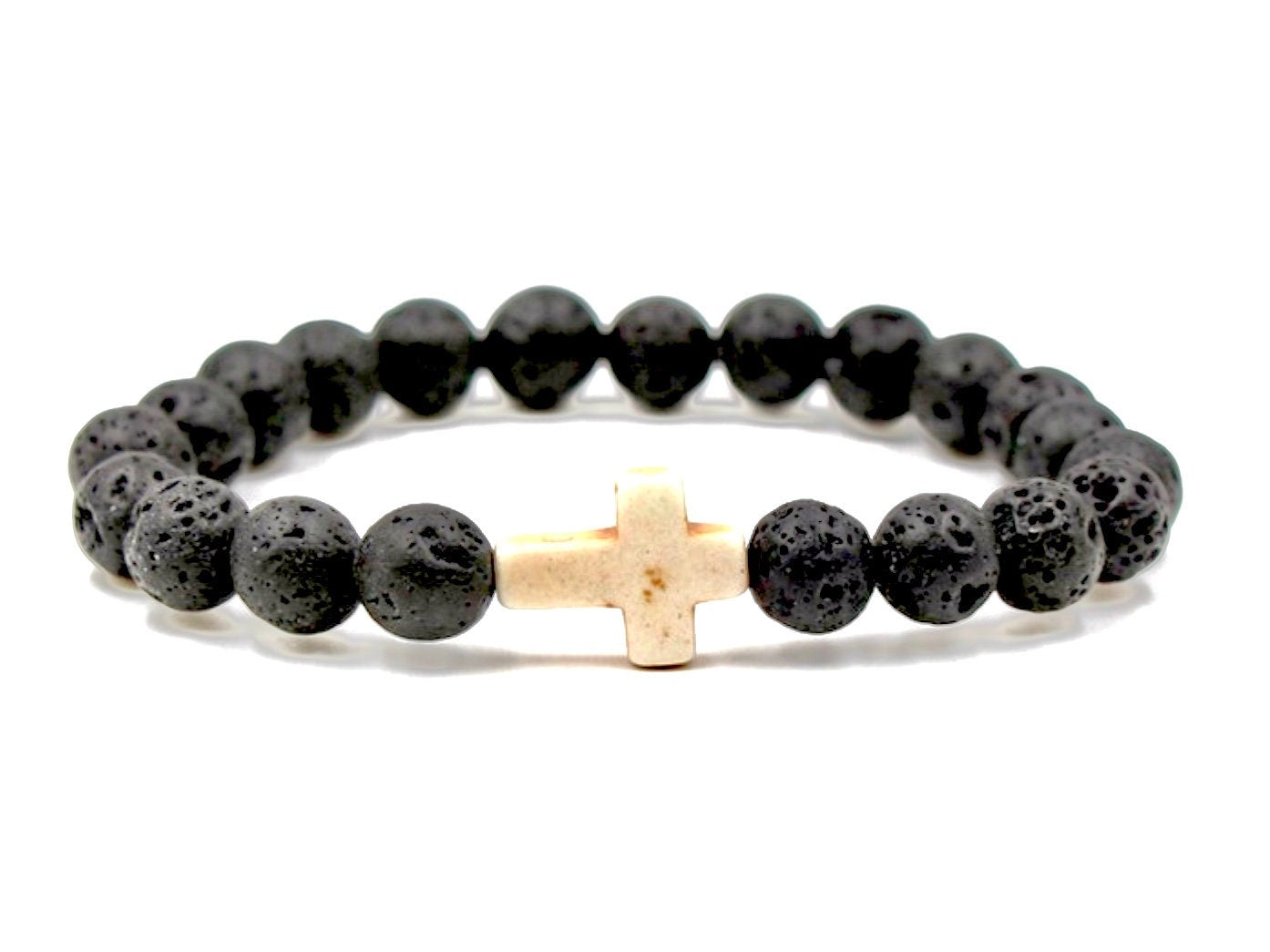 Stone bead bracelet with black volcanic stones and gold cross charm
