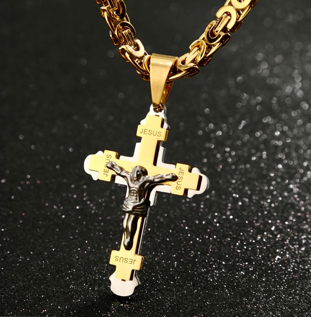 Gold-tone chain necklace with crucifix pendant and Jesus face inlays