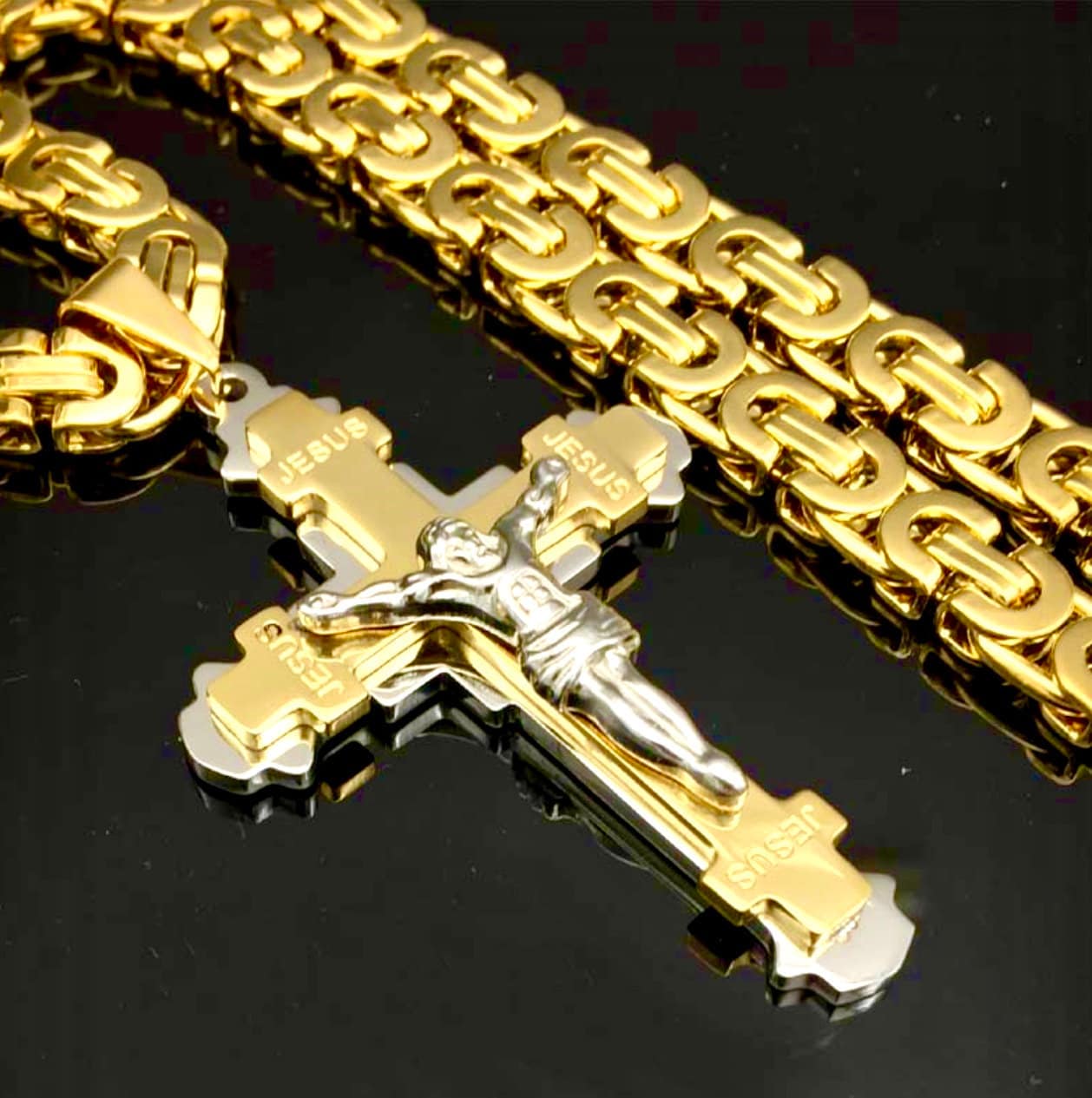 Crucifix cross pendant necklace with gold-tone chain and silver Jesus figure