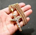 Gold-tone crucifix cross necklace with detailed Jesus crucifix pendant and curb chain