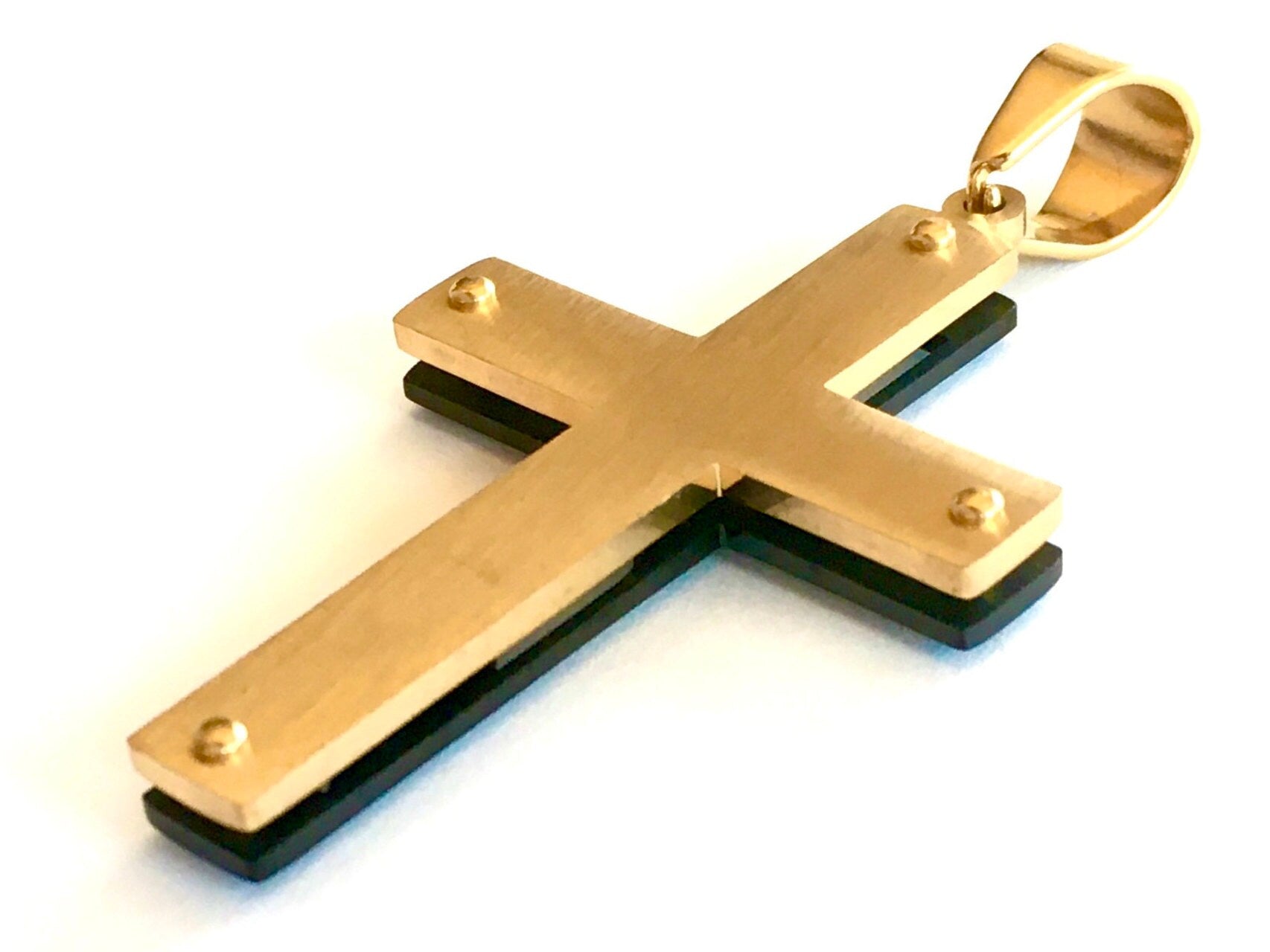 Gold crucifix cross pendant with black inlay and hanging loop