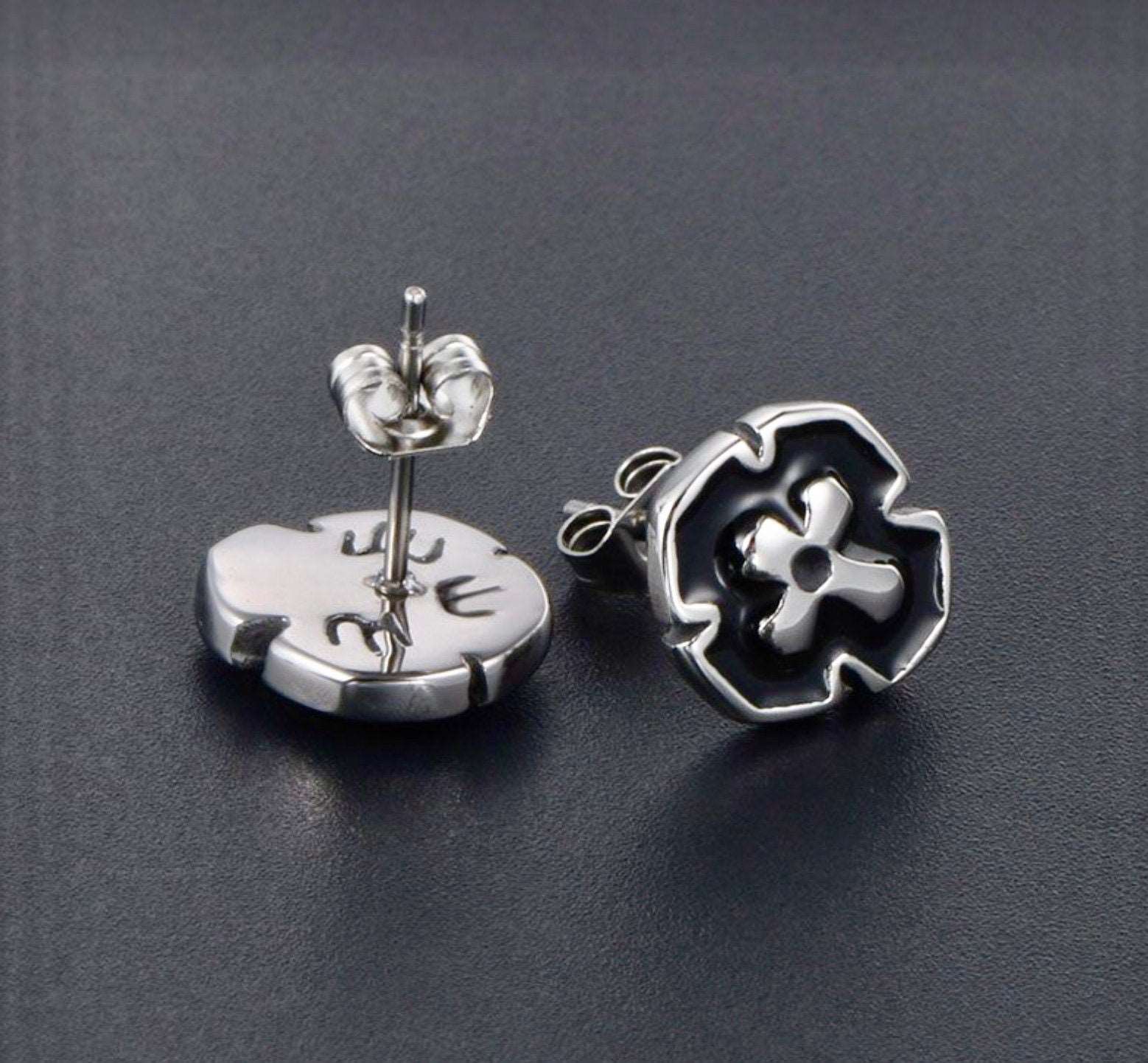 Cross stud earrings, silver-tone backs with butterfly posts and black enamel front
