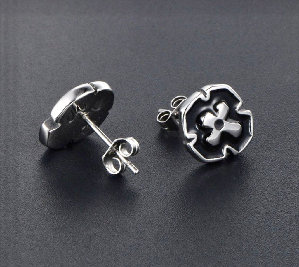 Cross stud earrings with black enamel faces, silver-tone circular frames and posts
