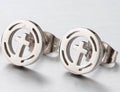 Round cross stud earrings in silver tone, circular border with plus cross