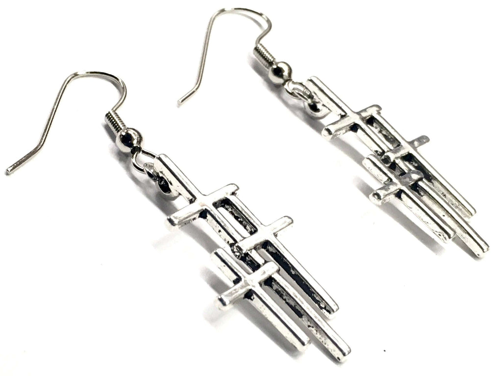 Silver triple cross drop earrings, angled view showing stacked cross bars