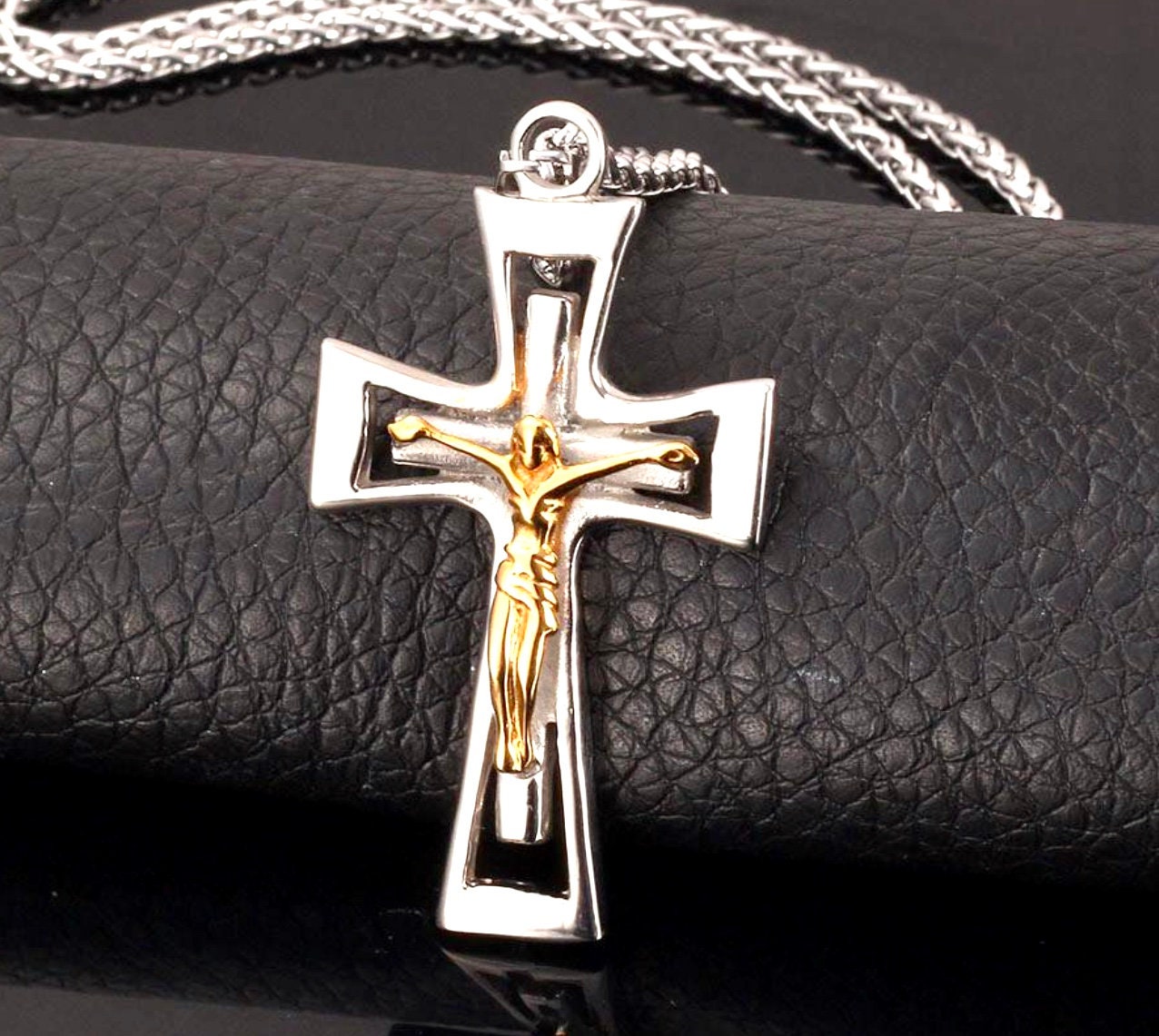 Silver-tone crucifix pendant necklace with gold Jesus figure and link chain