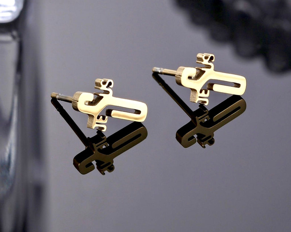 Gold cross-lettering stud earrings with push-back posts
