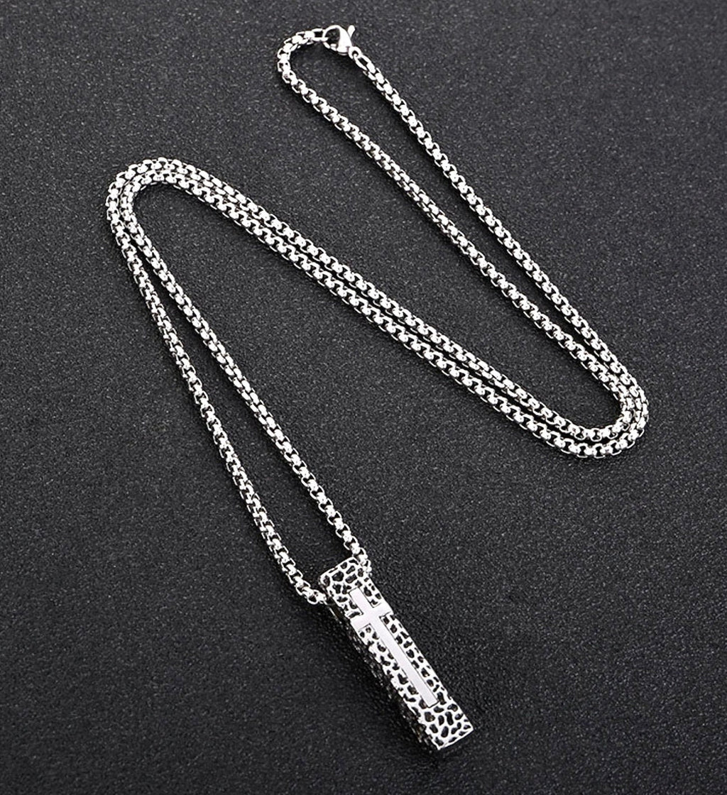 Crucifix shield necklace pendant with box chain links, shown from top angle