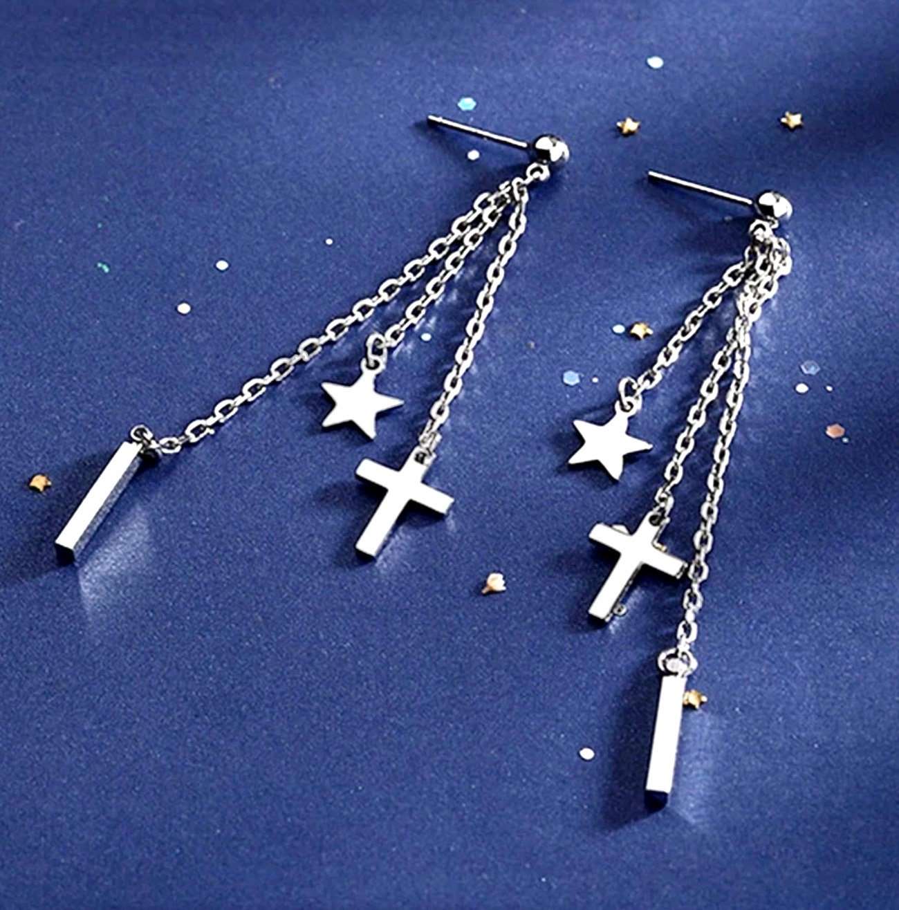 Silver star, cross, and bar drop earrings on double chain strands