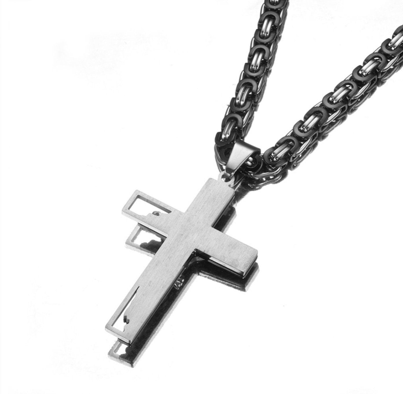Silver cross pendant necklace with black chain, crucifix detail