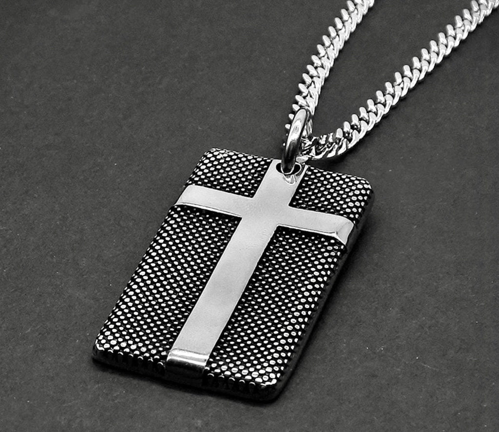 Stainless steel cross dog tag pendant necklace on a curb chain, textured face