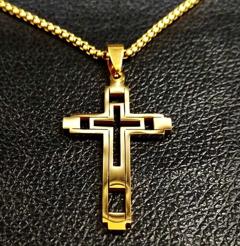 Gold cross pendant on link chain necklace