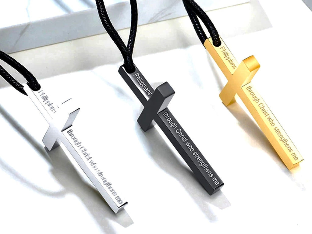 Men's cross necklaces on black cords, black, silver, and gold pendants