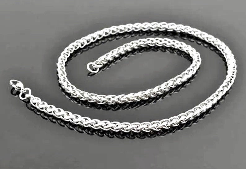 Silver-tone braided chain necklace, looped in a U shape