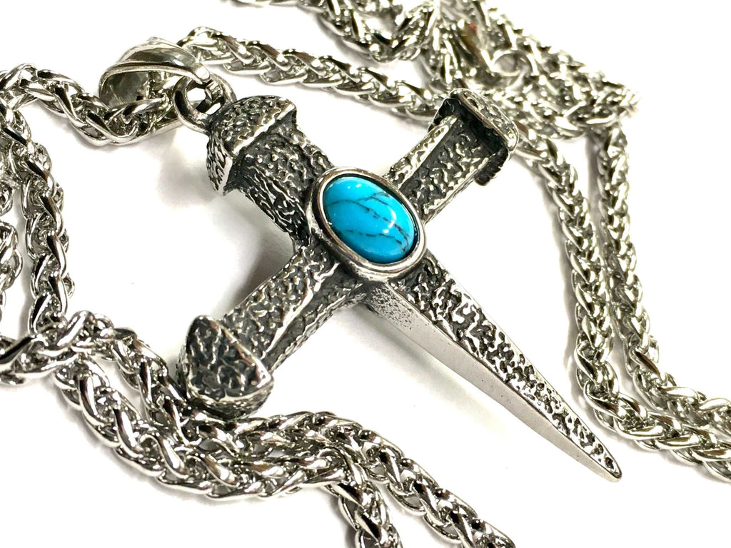 Cross pendant choker necklace with oval turquoise stone and hammered silver finish