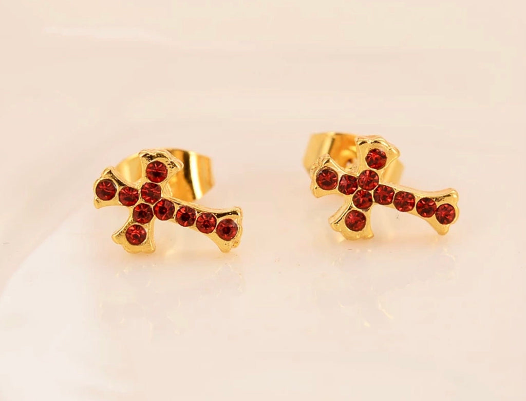 Gold cross stud earrings with red CZ stones, shown from the front on a light background