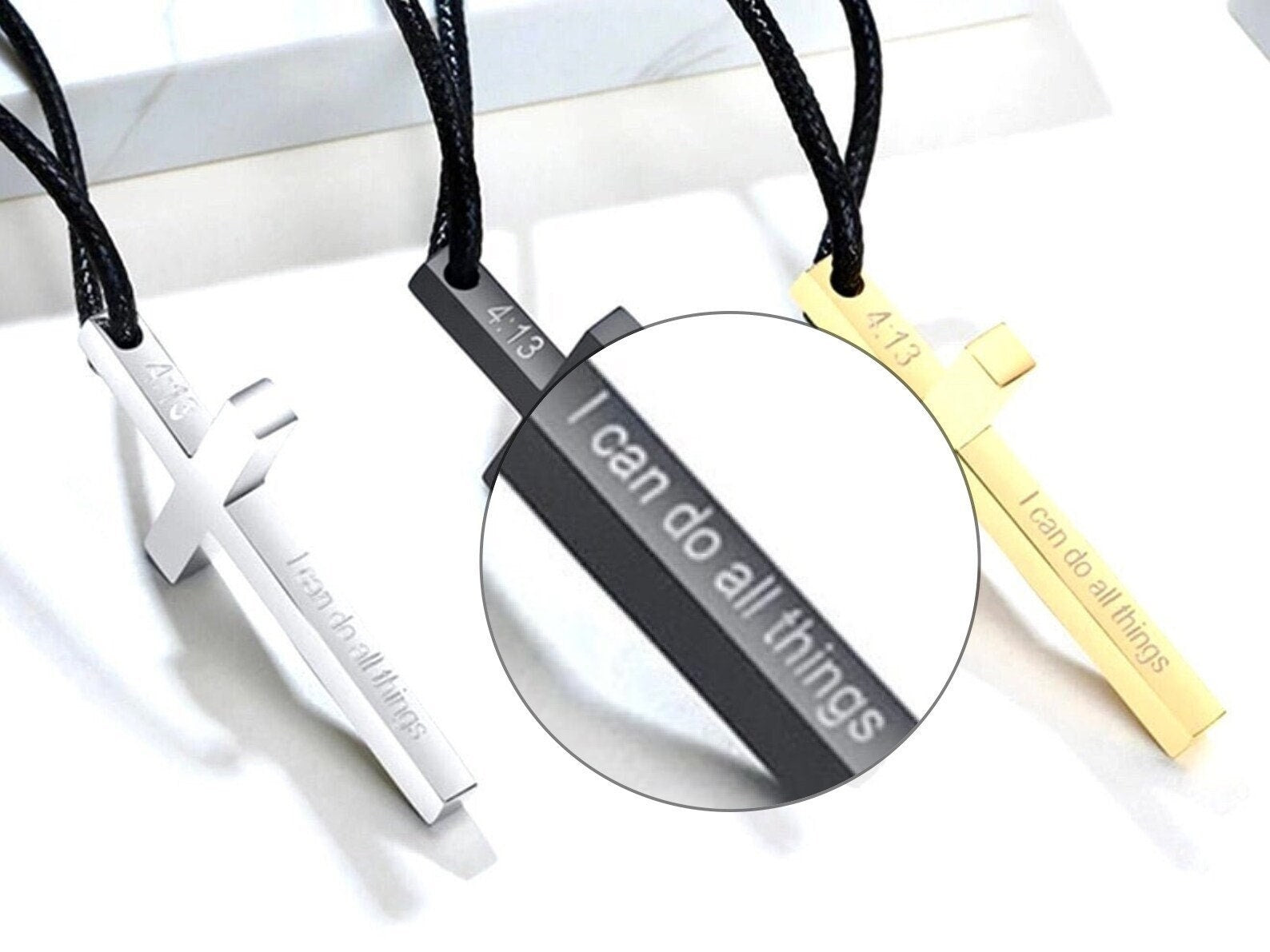 Men's stainless steel cross necklaces with black cords, silver and black pendants