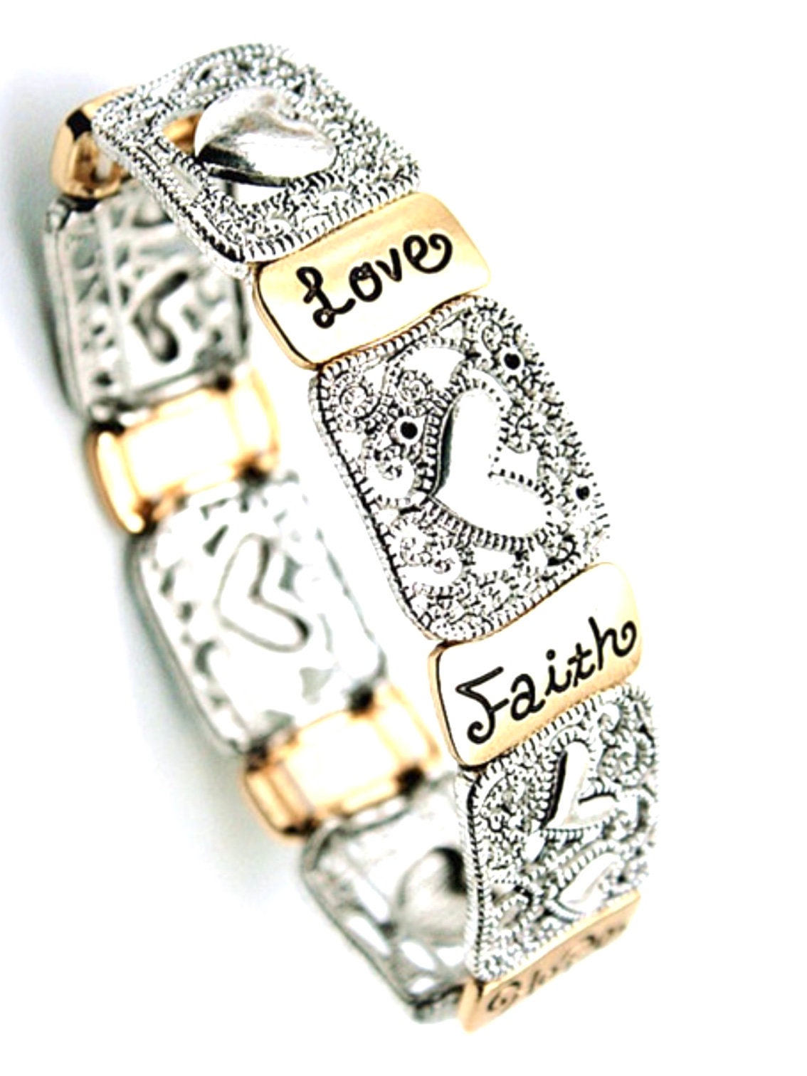 Silver-tone stretch bracelet with heart plaques and engraved words Love, Faith