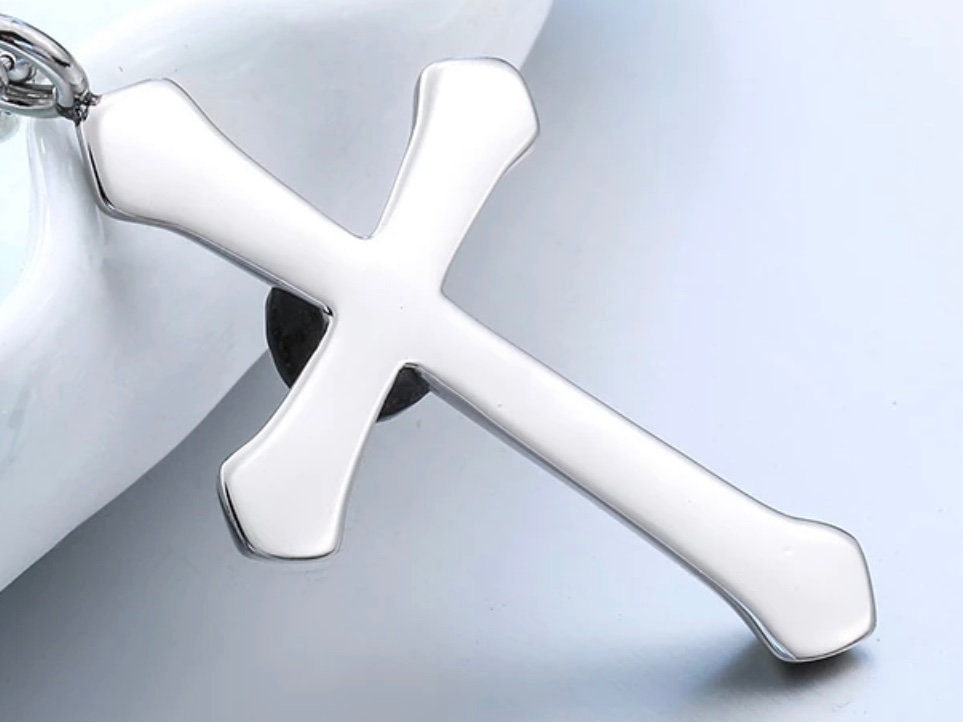 Silver-tone crucifix cross pendant with smooth edges