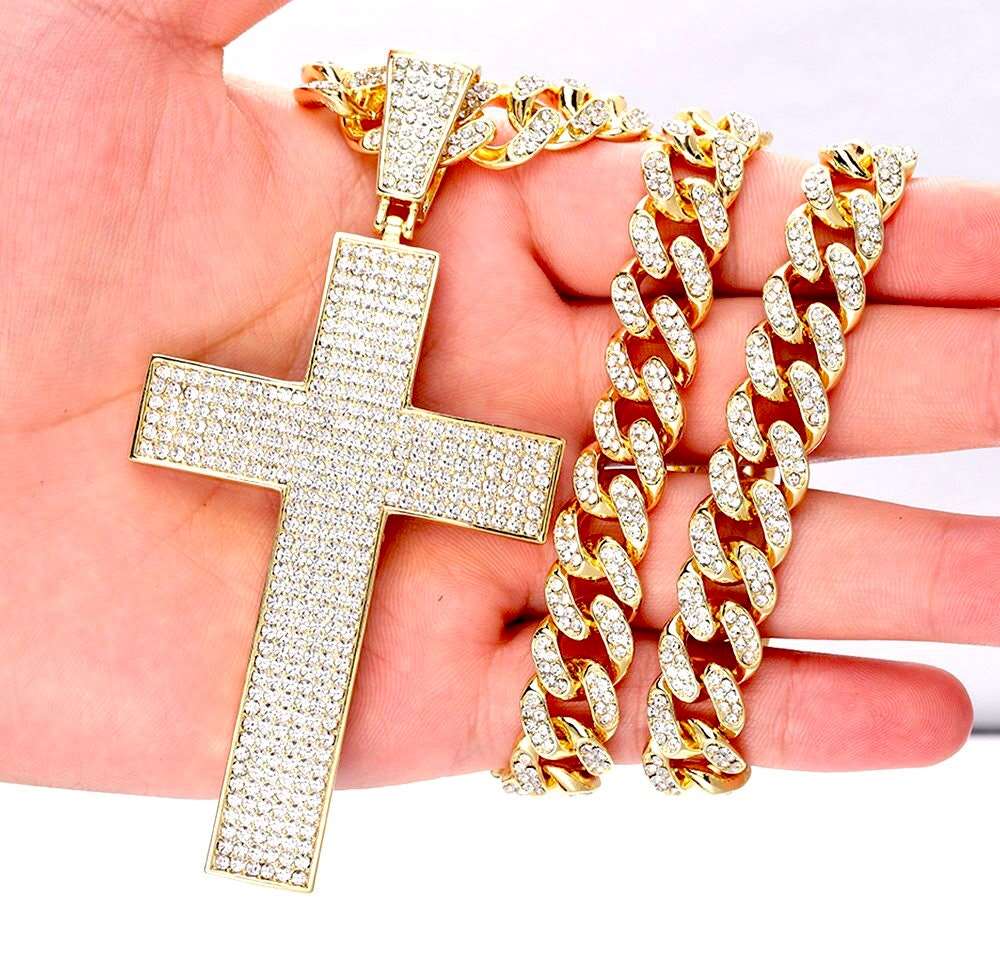 Gold-tone iced cross pendant with cubic curb chain necklace, sparkling rhinestone details