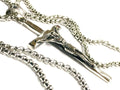 Stainless steel crucifix pendant with link chain, side view of Jesus relief.