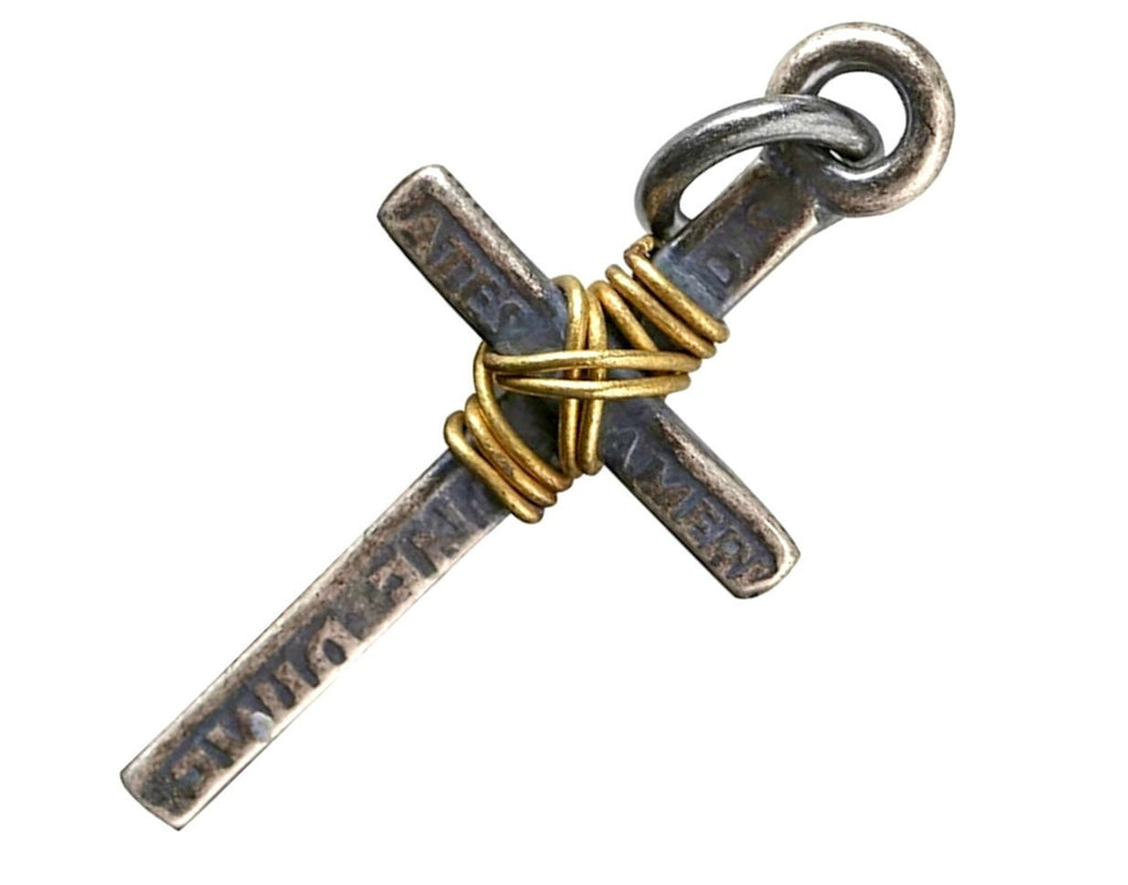Silver-tone cross pendant with gold wire knot detail and hanging loop at top