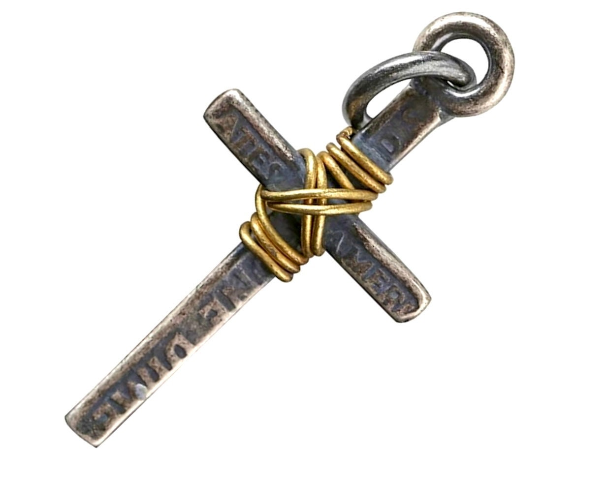 Silver-tone cross pendant with gold wire knot detail and hanging loop at top