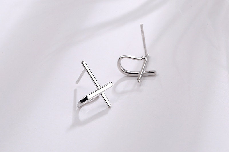 Sterling silver cross huggie stud earrings with straight post backs