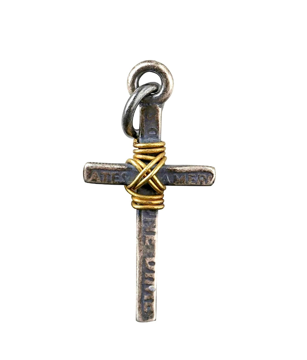 Silver-tone cross pendant with gold wire wrap at the bail and ring connector
