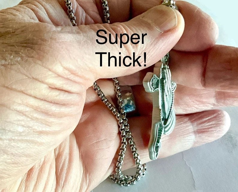 Thick silver chain rosary necklace with teal-inlay praying hands and crucifix