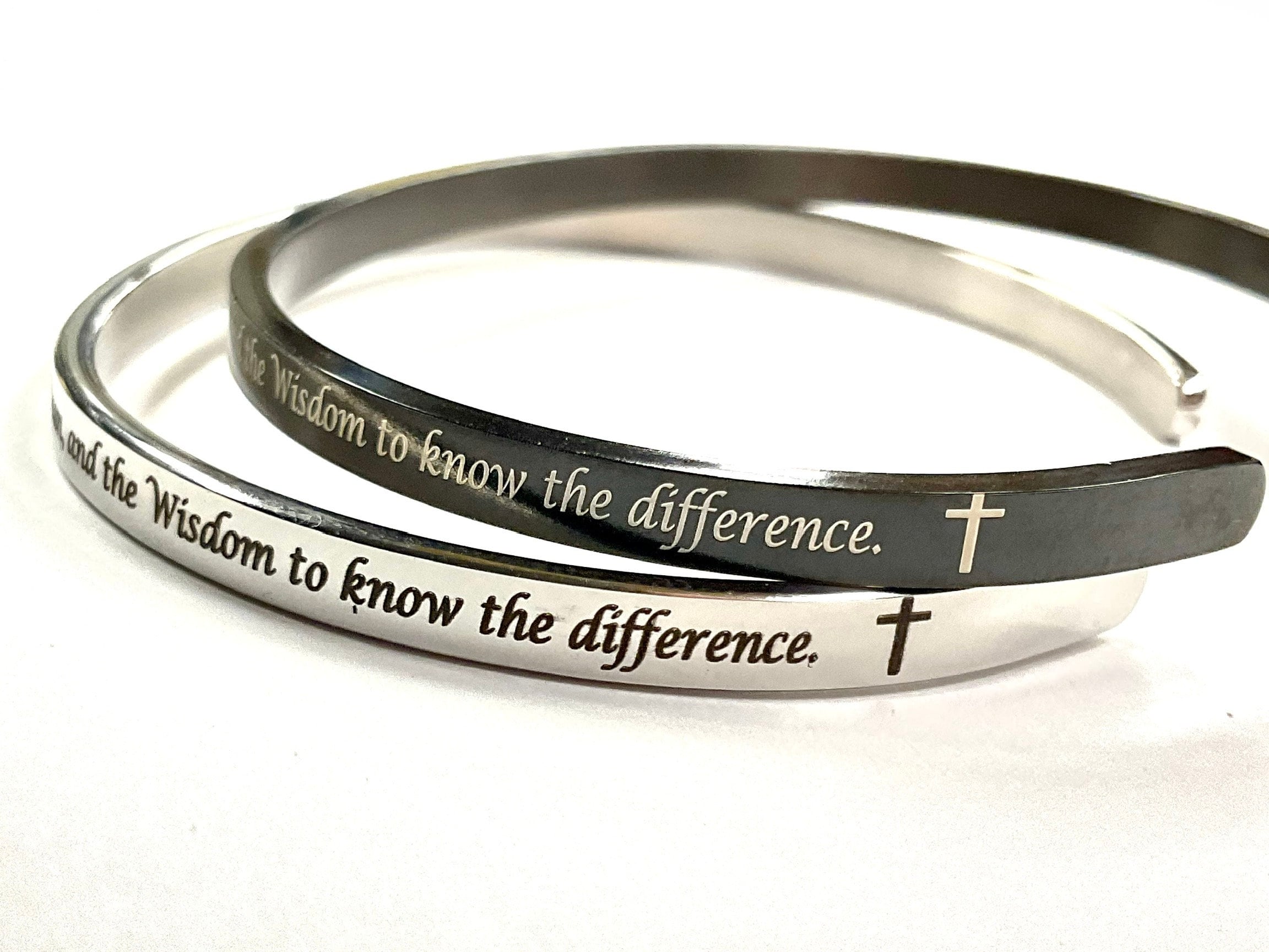 Black stainless steel cuff bracelet with engraved serenity prayer text and cross details