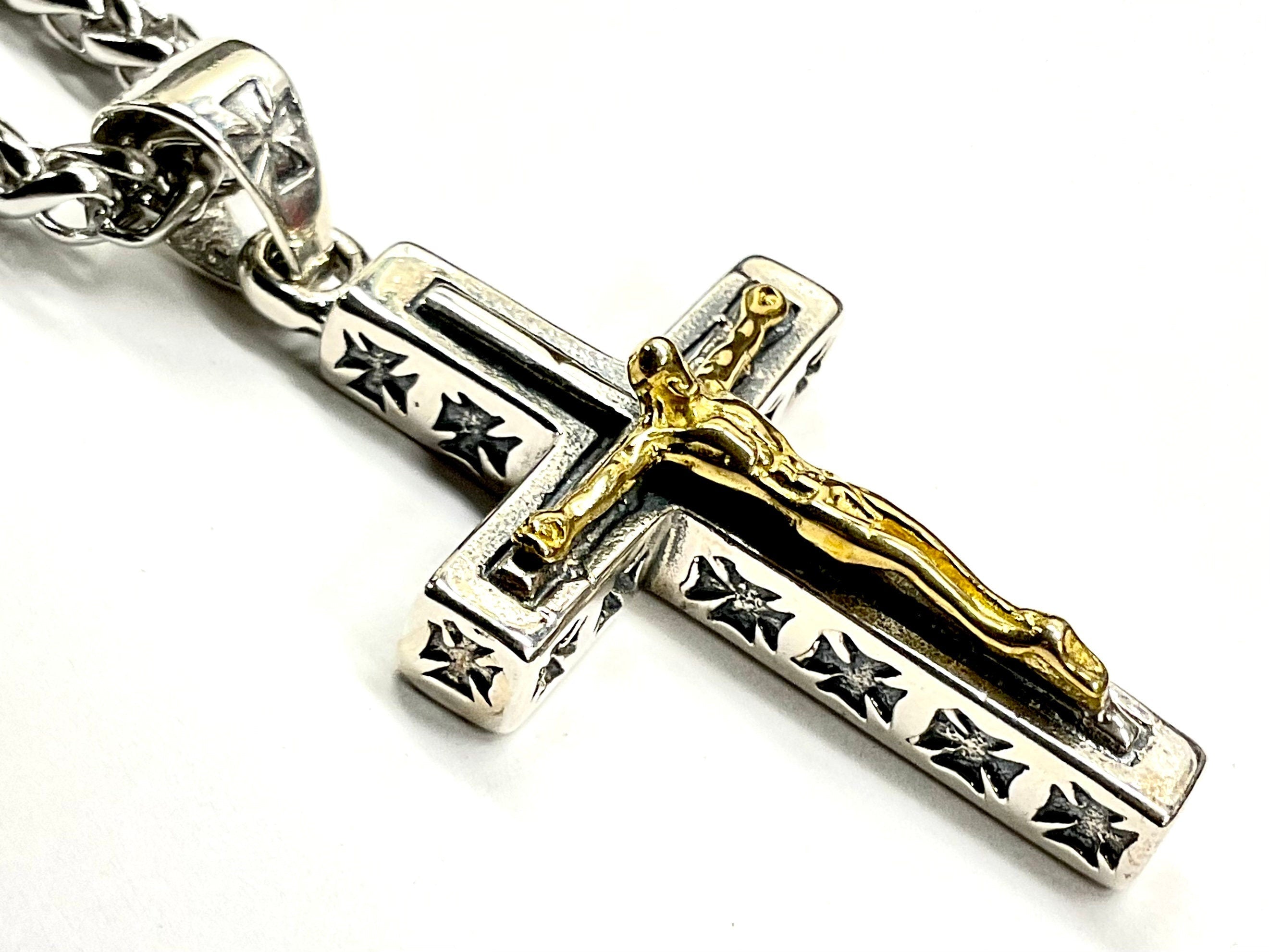 Two-tone crucifix cross pendant with gold-tone figure and engraved silver borders