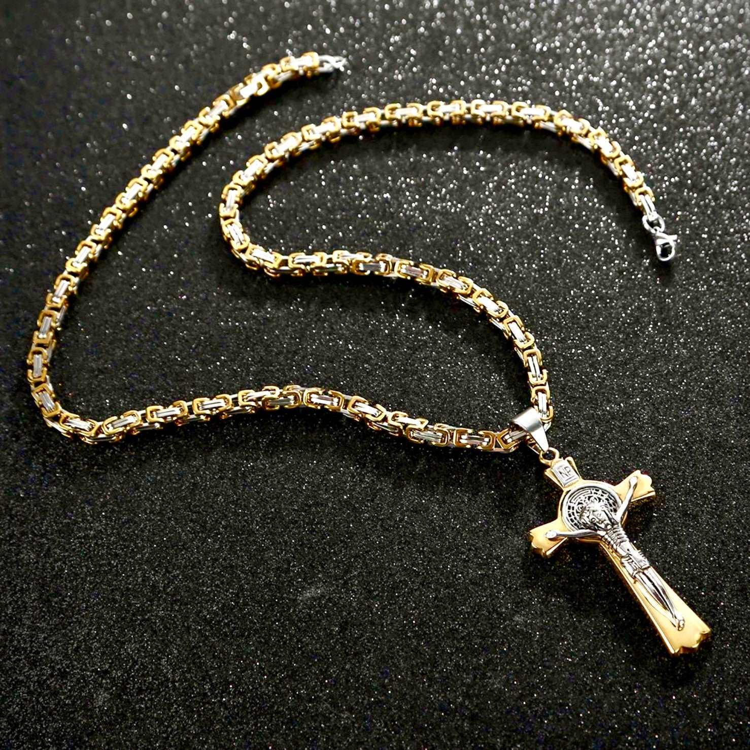 Gold-tone chain necklace with large crucifix cross pendant, round medallion face