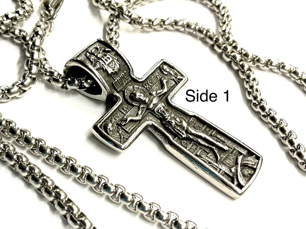 Silver crucifix cross pendant necklace with ornate panel detailing and chain links