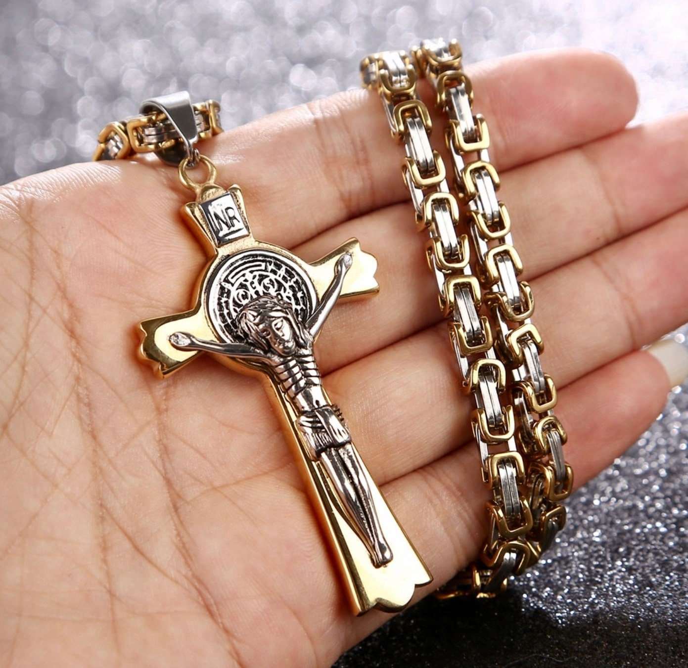Gold crucifix pendant necklace with Saint Benedict style cross