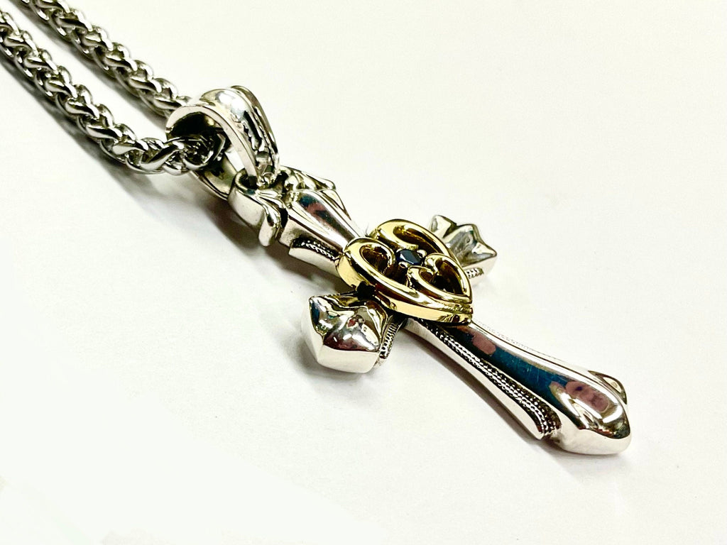 Cross pendant necklace with open heart in gold and blue zircon, sterling silver