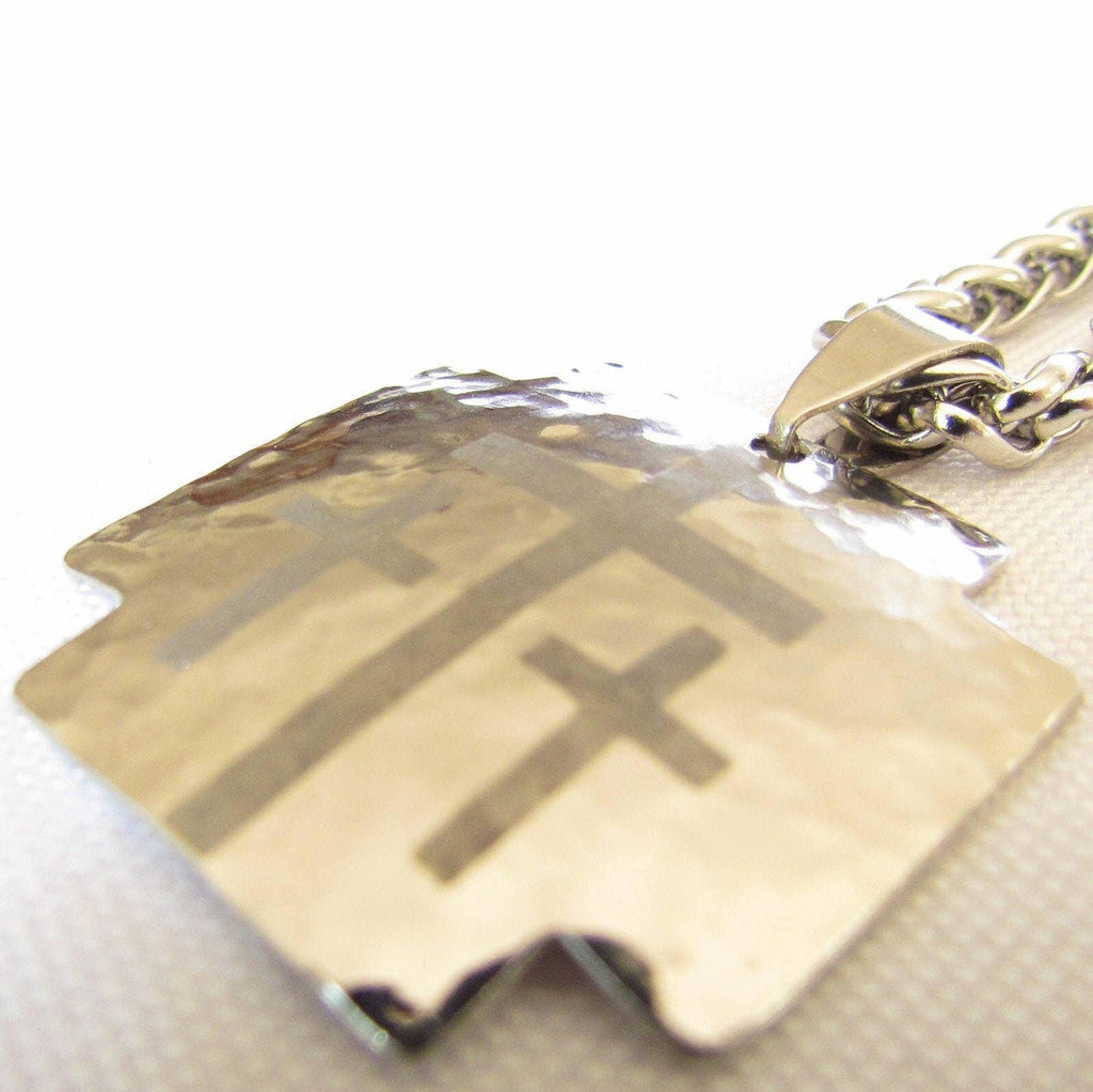Gold-tone hammered dog tag pendant with triple cross design and chain