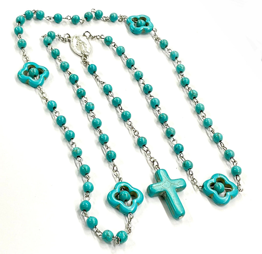 Turquoise bead rosary with cross pendant and flower-shaped spacers