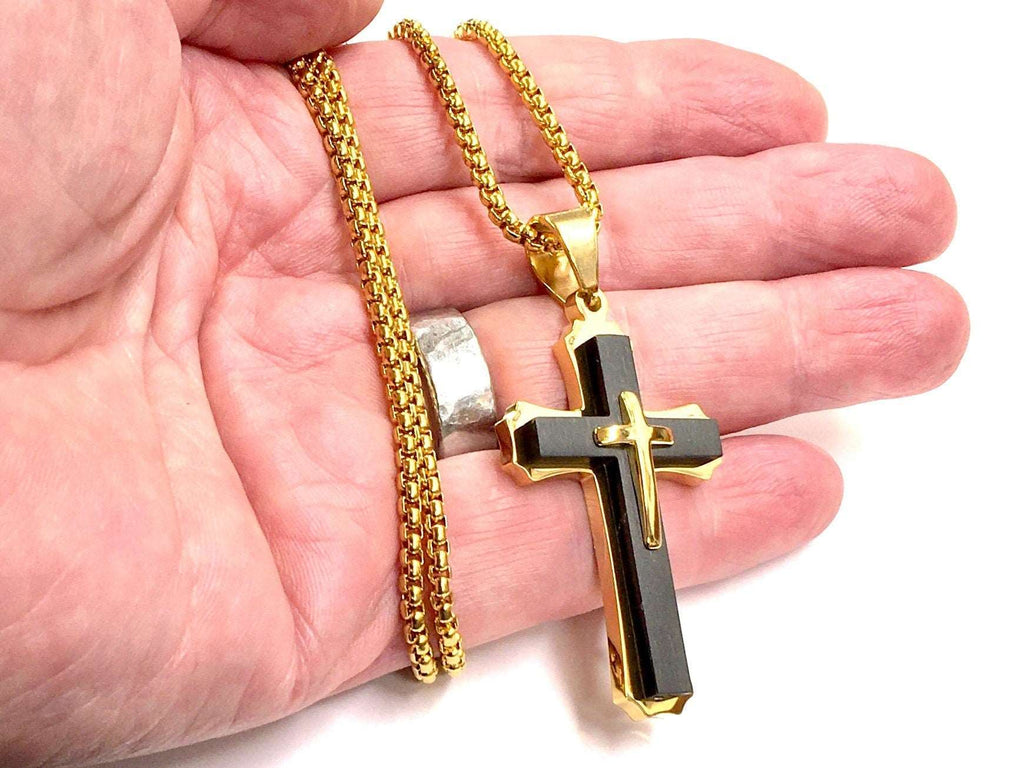 Gold-tone thick chain crucifix necklace with dark center bar