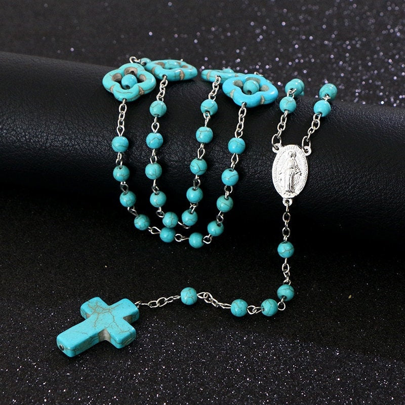 Turquoise bead rosary with cross and flower medallion centerpiece
