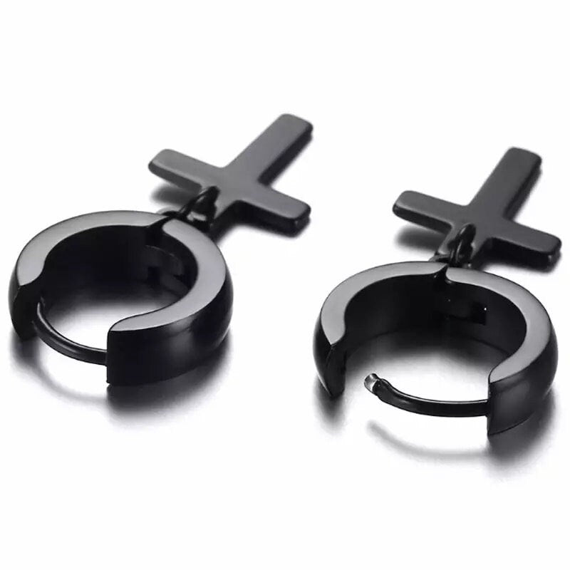Close-up of black cross dangle hoop earrings with lever backs and dangling cross charm