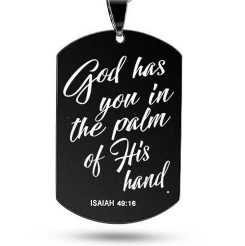 Black dog tag pendant with 'God has you in the palm of His hand' verse