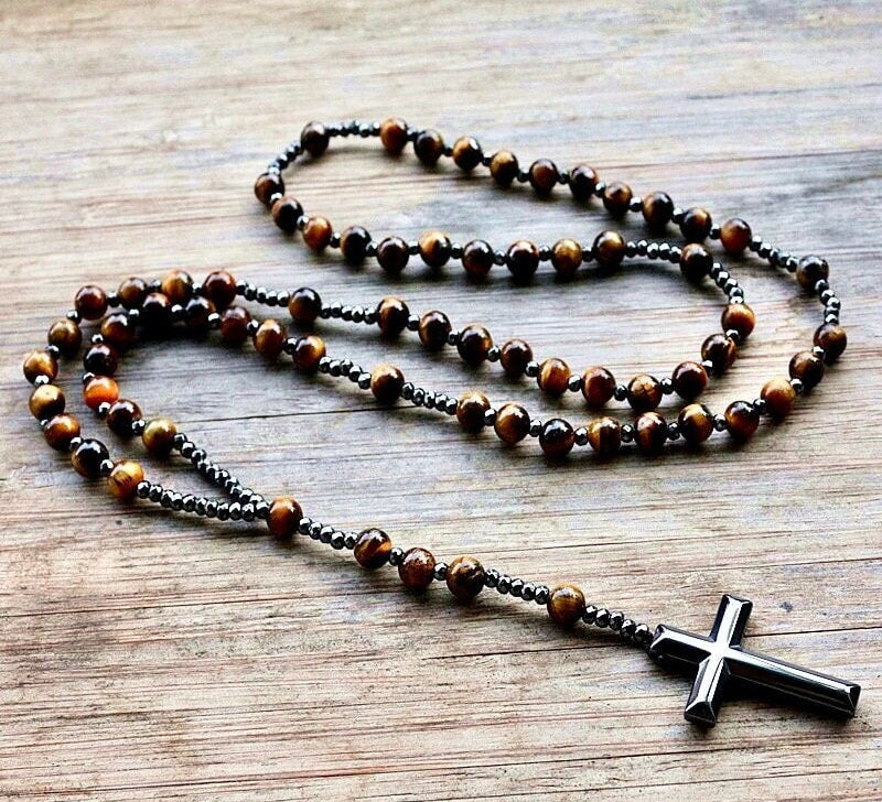 Tiger eye bead rosary with silver cross pendant and dark beaded chain