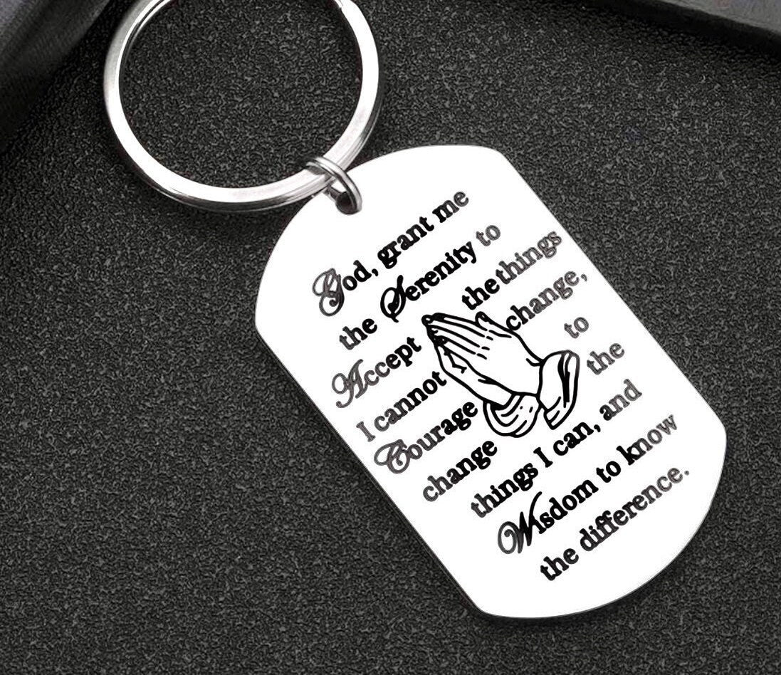 Silver serenity prayer dog tag keychain with engraved text and key ring.
